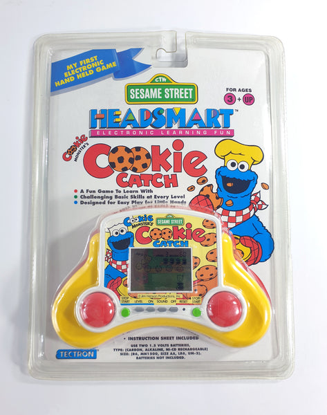 1993 Tectron Sesame Street Cookie Monster Electronic Handheld Game Console