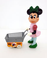 1960's-1970's Disney Minnie Mouse 11.5" Electronic Bump 'N Go Action Shopping Cart Figure